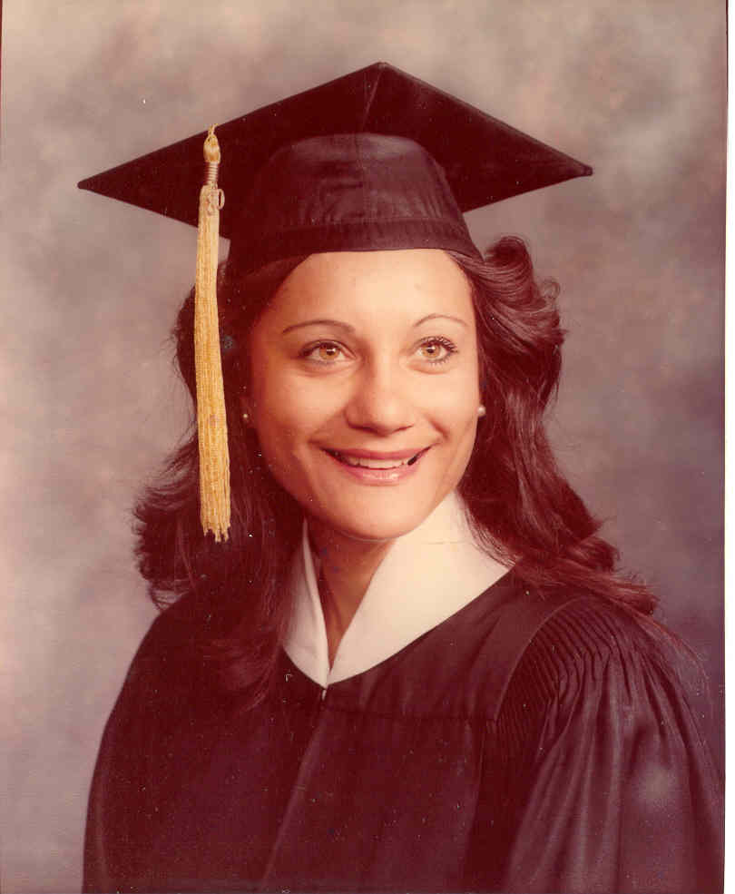 Picture of Ms. Revoir in her cap and gown when she graduated from Brigham Young University